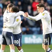 Preston North End's Daniel Johnson celebrates with team-mates Alan Browne (left) and Troy Parrott (right) after scoring the equalising goal from the penalty spot to make the score 1-1