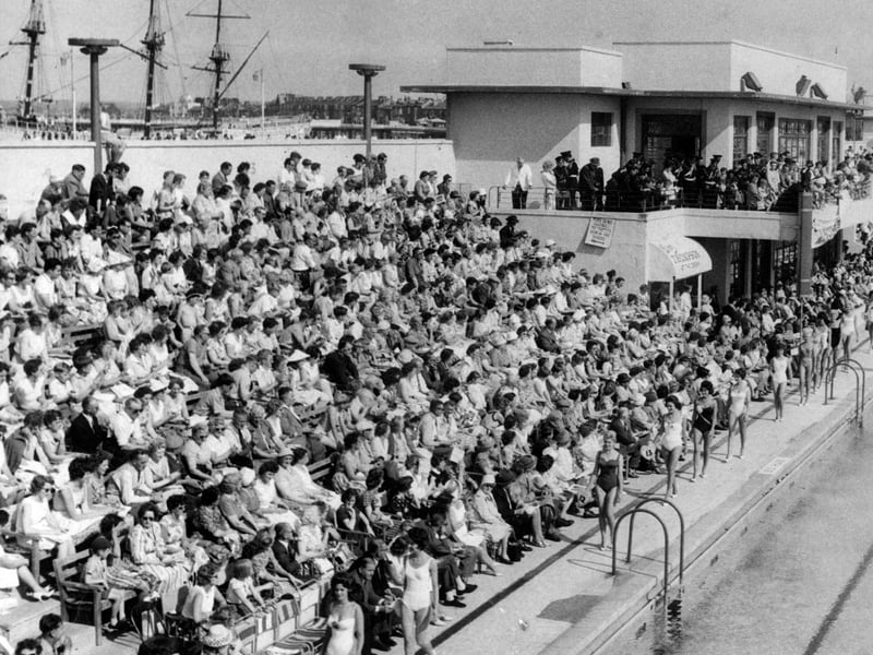 Crowds watch a Miss GB heat taking place at the stadium. The Moby Dick floating ship attraction, which was sadly destroyed by a fire in 1972, can be seen top left.