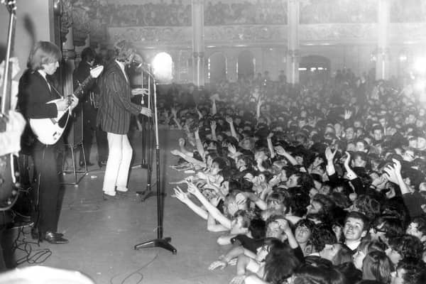The bad boys of Rock and Roll ran into a storm at the Empress ballroom in 1964. Minutes after this picture was taken, fans invaded the stage