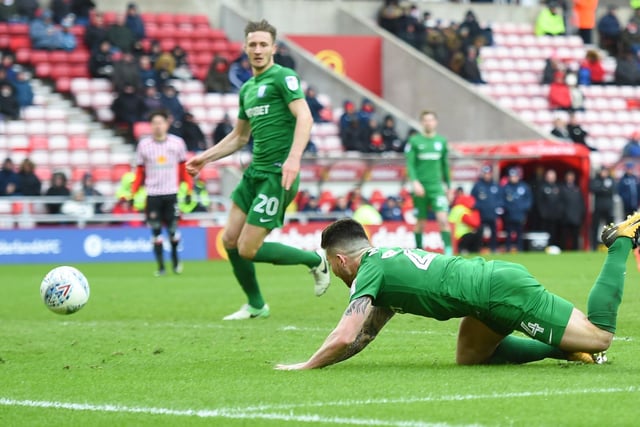 Preston's Sean Maguire dives and scores his sides first goal.