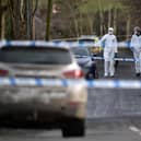 OMAGH, NORTHERN IRELAND - FEBRUARY 23: Police and forensics are seen at the scene of last nights shooting of a high profile PSNI officer at the Youth Sports Centre on February 22, 2023 in Omagh, Northern Ireland. (Photo by Charles McQuillan/Getty Images)