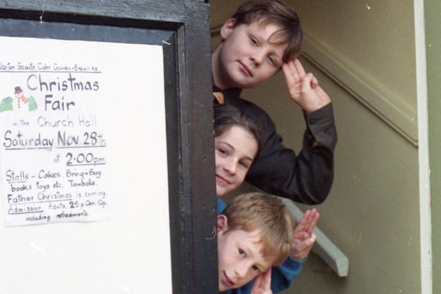 Guides, brownies, cubs and scouts joined forces at Warton, near Preston, for an annual fund-raising event. Children from the 1st Warton St Oswald's brownies, guides and scout group staffed stalls at their Christmas Fair at Warton Church Hall. More than £200 was raised and will be split between the four groups. Pictured: Scout Peter Harrison, guide Mary Hellewell, cub Mark Shuttleworth and brownie Jennifer Beck