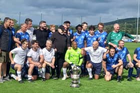 Players from both teams pose for a photo at the end of the game. Credit: Longridge Town