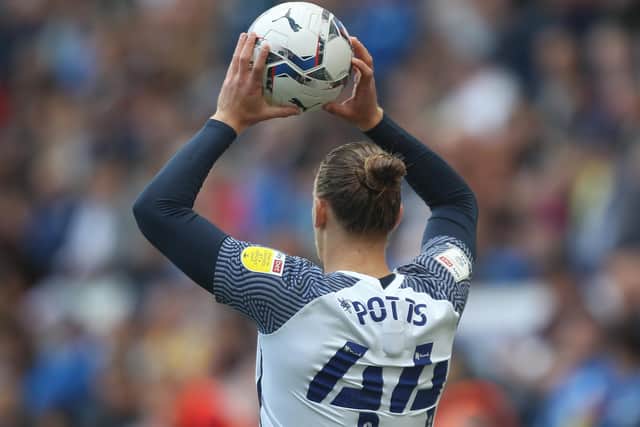 Preston North End's Brad Potts takes a throw in during the final game of the season.
