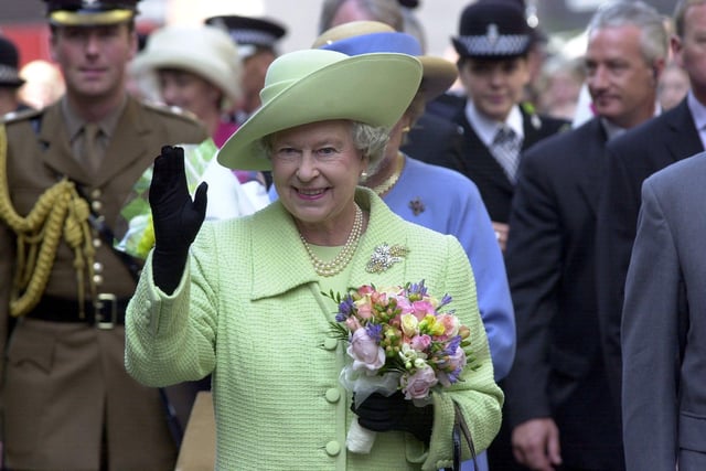 The Queen gives a wave during her visit to Preston during her Jubilee tour