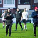 Bamber Bridge boss Jamie Milligan, right