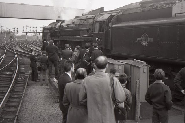 Preston Railway Station 1968.
No. 70013 ready to depart for Liverpool with the last leg of a railtour. April 20, 1968.

Photograph courtesy and copyright of Geoff Coward © 

