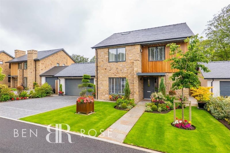 Stunning fourbed Chorley superhome with ultra modern design, huge garden, and lake views up