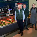 (l-r) Kathy, John and Danny Woods with Dave Shaworth inside Woods Farm Shop, which suffered from a bird flu outbreak last week.