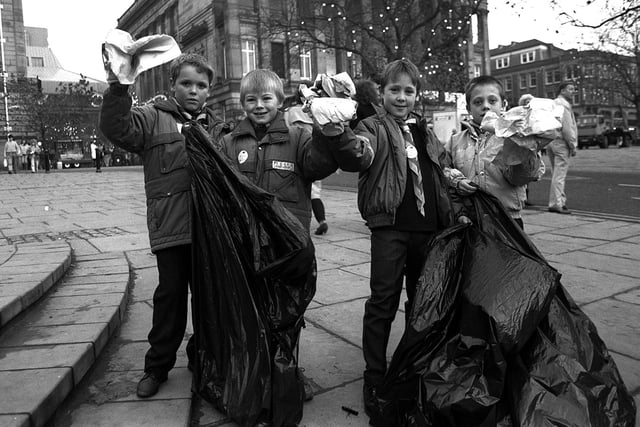 Scouts collect litter from the Flag Market for a pre-Christmas clear up in 1989