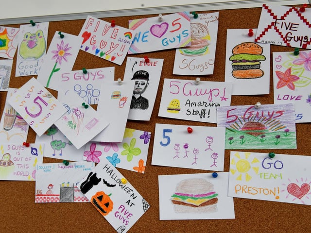 The drawing board where customers and staff can share their artwork.