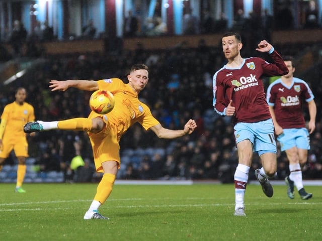 Preston North End's Alan Browne looks to get in a shot under pressure from Burnley's David Jones