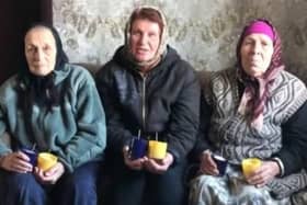 Citizens in Ukraine with Kerax-made candles