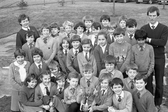 Safety-conscious youngsters at St Peter's CE Primary School in Fulwood wheeled to success in a Lancashire cycling proficiency test as they picked up the Coun J Heatley trophy for the second time