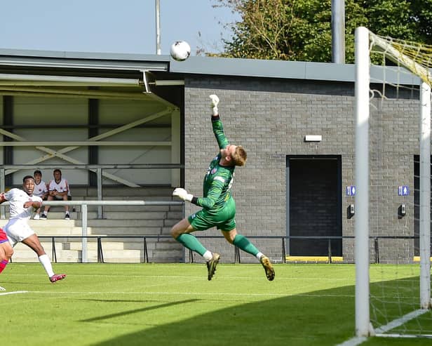 Siya Ligendza forces Aldershot keeper to punch clear (photo: Steve Mclellan)