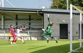 Siya Ligendza forces Aldershot keeper to punch clear (photo: Steve Mclellan)