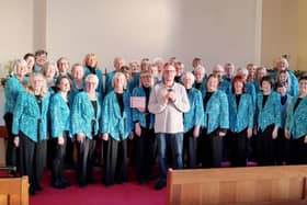 John Garrett with Eskdale festival trophy and Pendle Ladies Choir