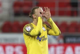 Preston North End's Brad Potts celebrates with the fans at the end of the match against Rotherham