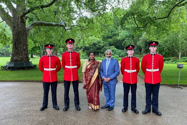 Dr Sakthi Karunanithi, director of public health for Lancashire County Council, attending a Buckingham Palace Garden Party with his wife