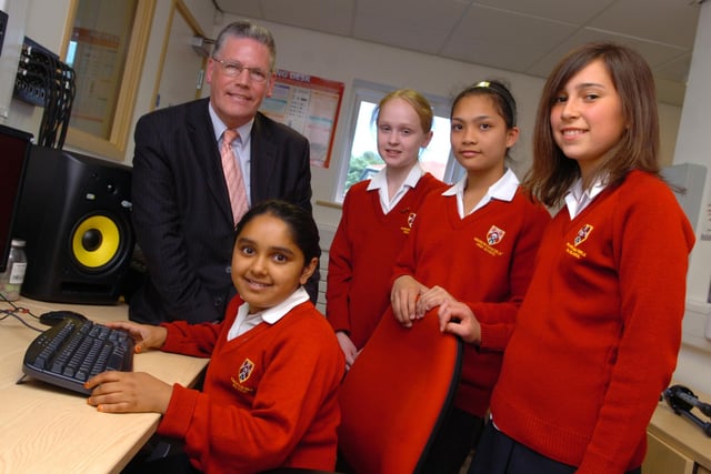 MP Mark Borrow in the recording studio with Olivia Winter, 12, Phrances Perez, 12,  Emily Wells, 12, and Sobia Bibi, 12, during the opening of the new reception area and music suite at Penwortham Girls High School
