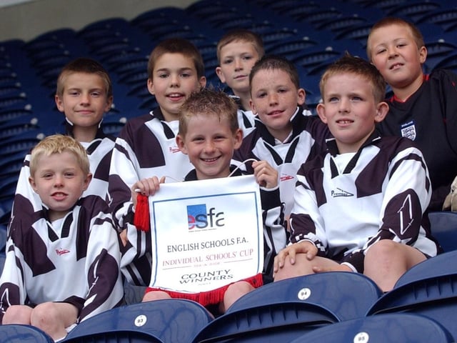 The U11s football team from Fulwood and Cadley Primary School during their to the Preston North End ground in 2003