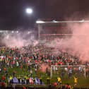 Nottingham Forest fans invade the City Ground pitch after their penalty shoot-out win over Sheffield United. Pic: Getty Images