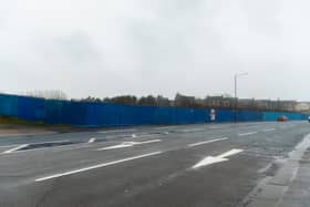 The blue hoarding surrounding the former Frontierland site on Morecambe Promenade. Photo: Kelvin Stuttard.