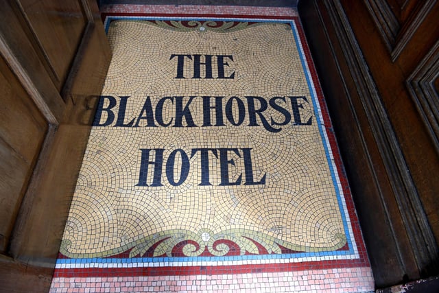 The tiled floor in the pub. Originally dating from the boom time of pubs in the Victorian era, it was rebuilt in 1898 to the designs of local architect J A Seward for Kay’s Atlas Brewery of Manchester.
