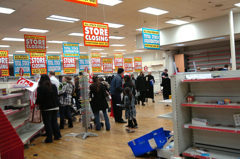 Shoppers look for a last minute bargain during the Woolworths closing down sale