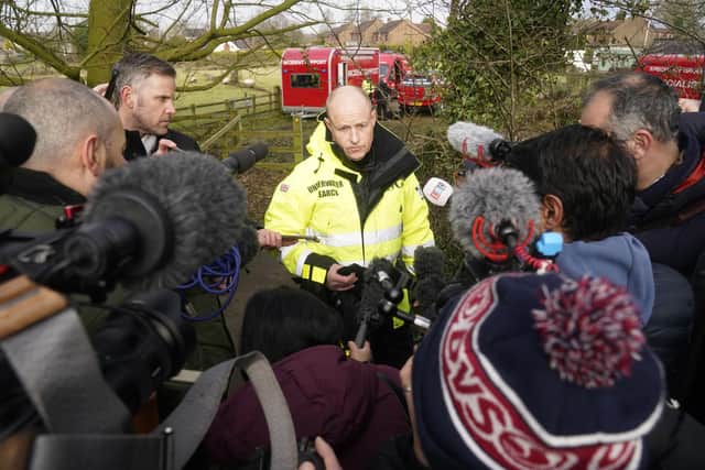 Peter Faulding (centre) CEO of private underwater search and recovery company Specialist Group International (SGI), speaks to the media in St Michael's on Wyre, as police continue their search for missing woman Nicola Bulley. Picture by: Danny Lawson/PA