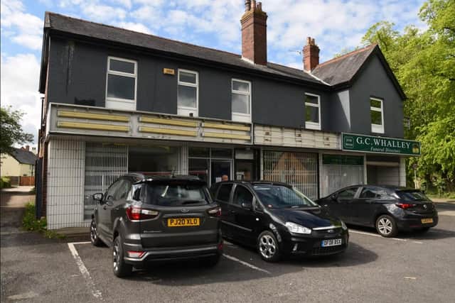 The two empty shops which will be converted into a 'high class' bar.