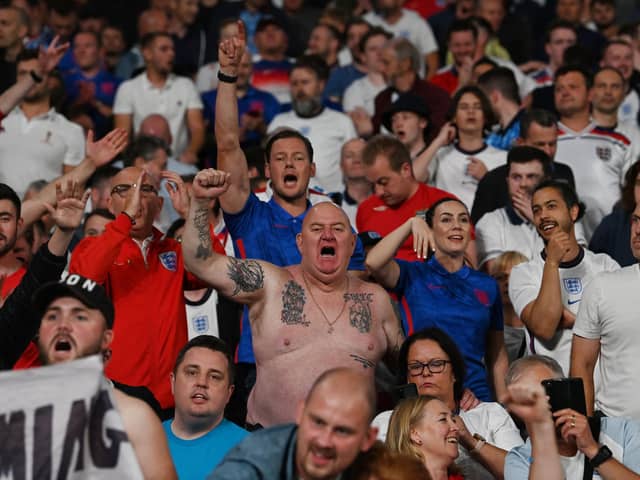 England supporters celebrate after winning the UEFA EURO 2020 semi-final football match between England and Denmark at Wembley Stadium in London on July 7, 2021. (Photo by Paul ELLIS / POOL / AFP) (Photo by PAUL ELLIS/POOL/AFP via Getty Images)