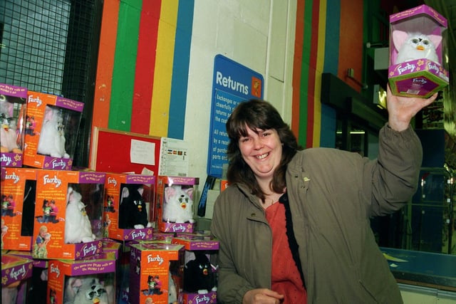Susan Lynch of Blackpool with her Furby at Toys R Us, Preston. She had queued up since five in the morning to get her hands on the toy back in 1998