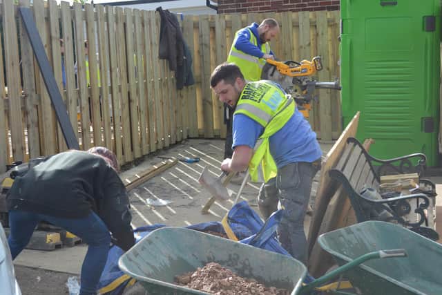 A team of more than 40 from across the country worked for three weeks building an extension, installing a wet room and erecting a new garden fence. (Band of Builders/PA)