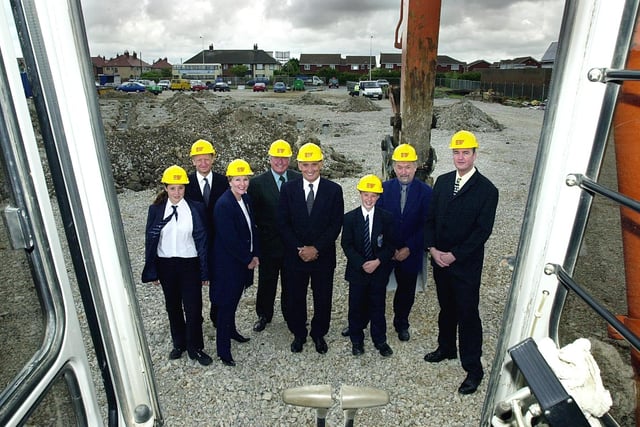 Work officially began on the new Fleetwood High School, with representatives from Lancashire County Council, Eric Wright construction, and the school. The first JCB arrives, watched by (left to right) pupil Teri Perkes, 12, managing director of Eric Wright Group Michael Collier, head Margaret Dudley, chair of governors Des Lund, chairman Eric Wright, Adam Helsby, 12, and county councillors Chris Cheetham and Clive Grunshaw