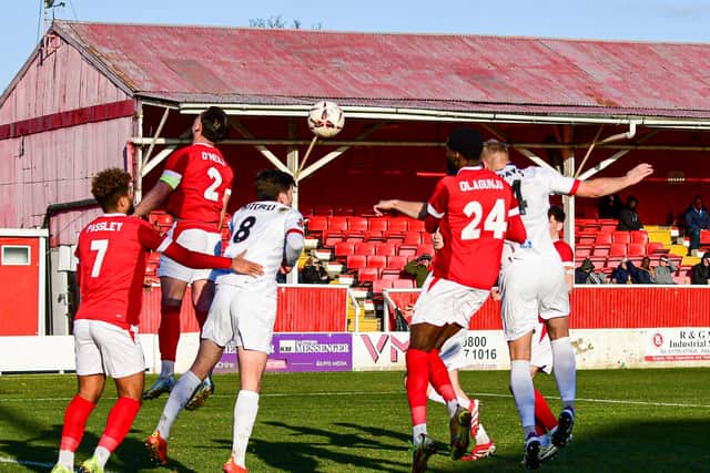 Harry Davis far right gets in a header but goes wide of the mark (photo: Dave Plumb)