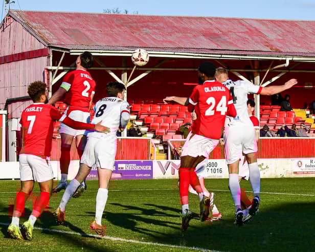 Harry Davis far right gets in a header but goes wide of the mark (photo: Dave Plumb)