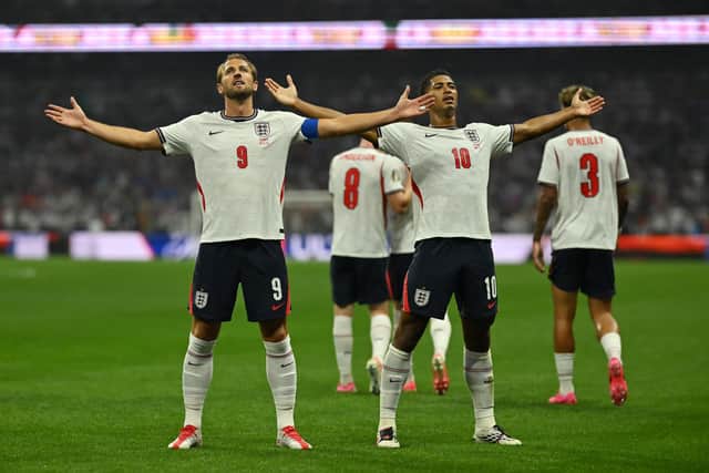 Harry Kane (left) and Jude Bellingham (right) celebrate England's first goal in the win over Mexico at the World Cup (Getty Images)