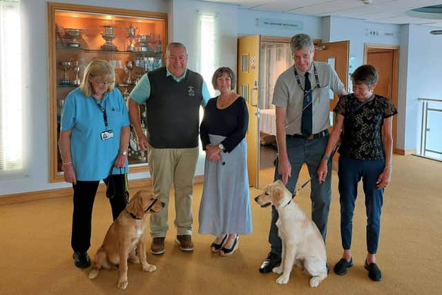 Group photo featuring Linda, puppy William, Dave and Janet from Leyland Golf, puppy Ruby, Nick and Ange