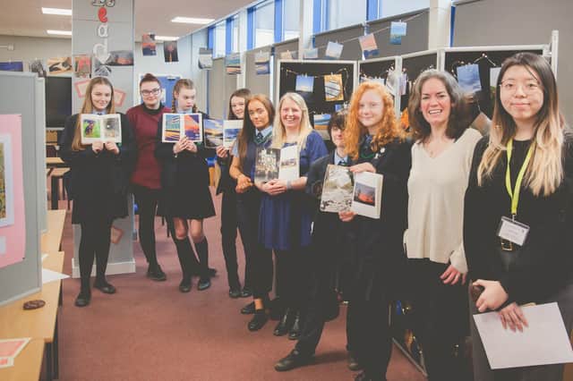 The launch of the exhibition at Our Lady's Catholic College in Lancaster with project leader, Ginny Koppenhol (second from right)