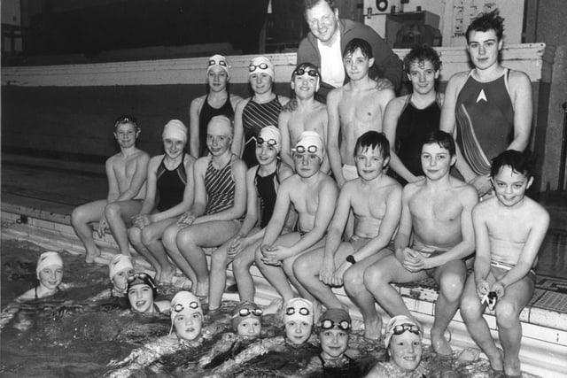 Some of the many members of the Preston Piranha Club, pictured with coach Ray Walton in 1986