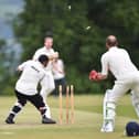 The bails fly in a dramatic moment from a previous Blackburn Diocese cricket match.