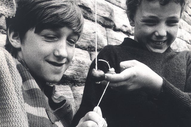 Kevin Hutchinson and Mark Dawes of Crookesmoor Junior School playing conkers on September 24, 1974.