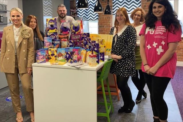 Staff from Preston recruitment company the Clayton Group with their donations of eggs and craft kits