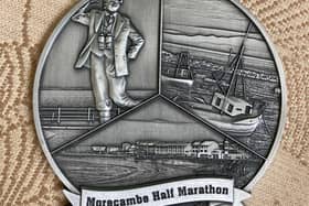 The first 150 entrants to complete the Morecambe Bay Half Marathon in May 2022 will receive this medal.