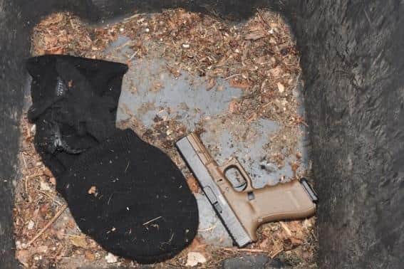 A gun and balaclava recovered by police
