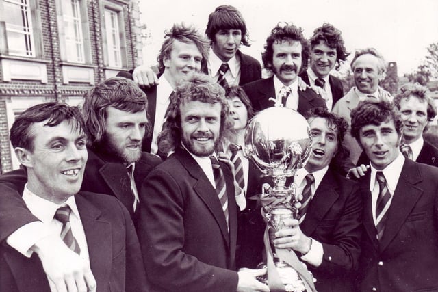 Morecambe players and officials at the town hall with their FA Trophy in 1974
