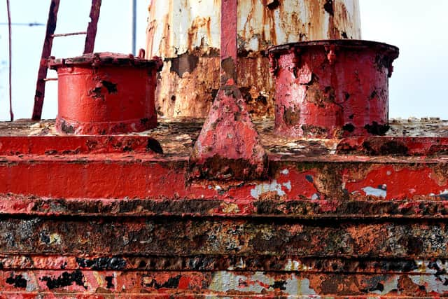 Photo Neil Cross; The Nelson red â€˜bell-boatâ€™ buoy at the entrance to Preston Docklands