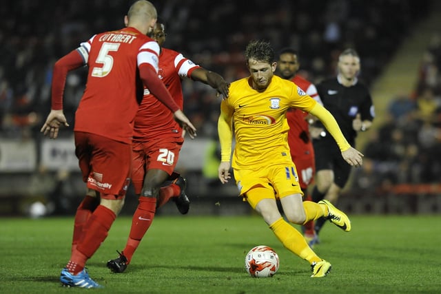 Preston North End's Joe Garner battles with Leyton Orient's Scott Cuthbert.