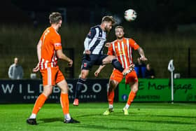 Ollie Shenton heads home in the 9-0 rout of Liversedge on Tuesday (photo: Stefan Willoughby)